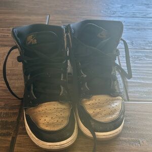 Nike High-Top Black and Gold Sneakers